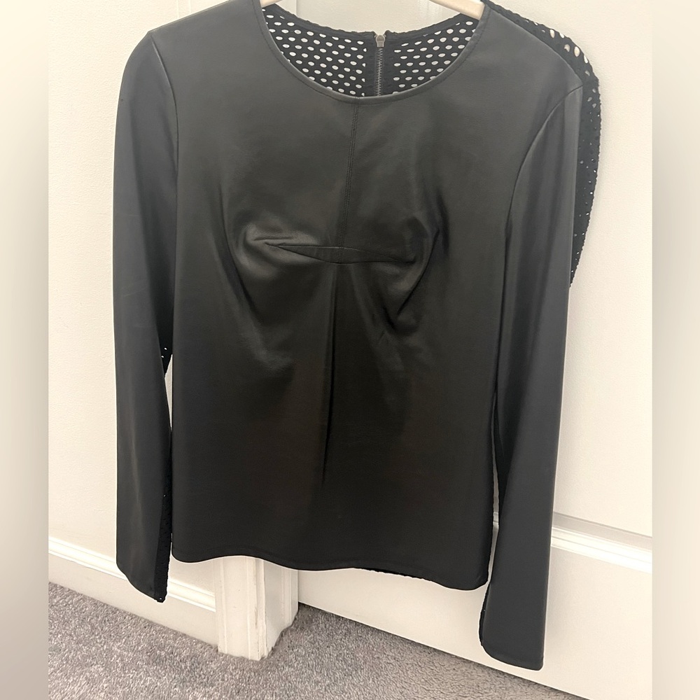 Long sleeve Leather top with like mesh back.
